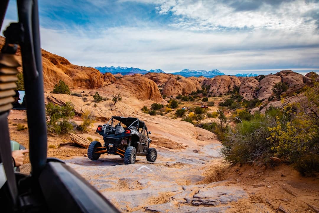 Off-roading through a rocky desert landscape.