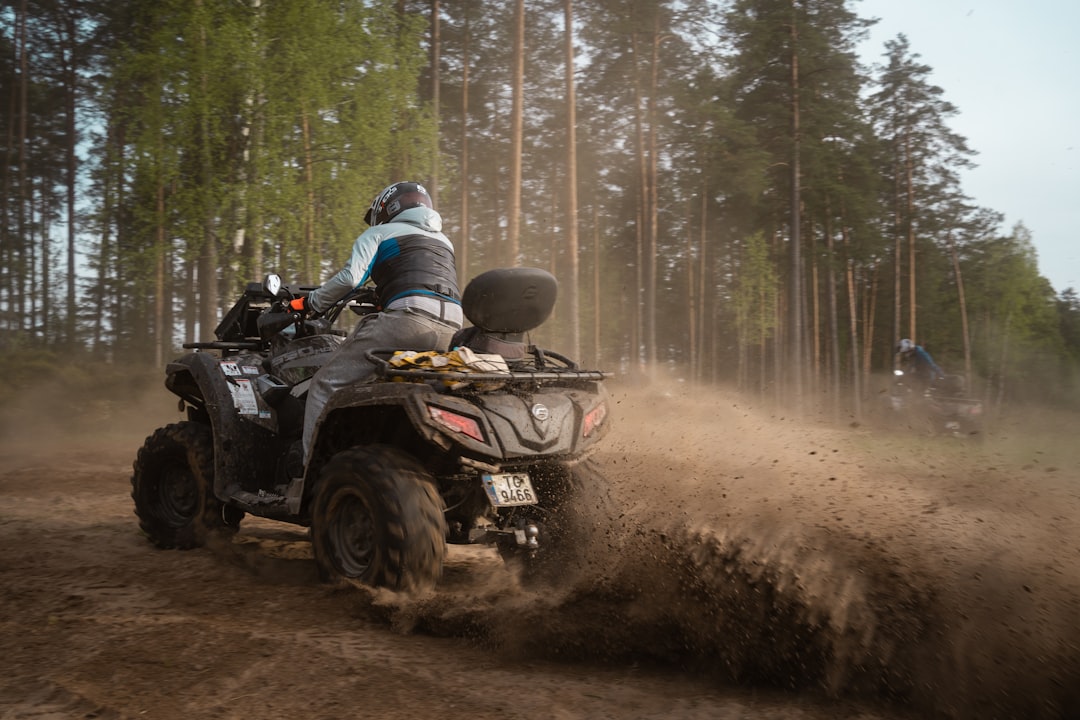 A used side-by-side on a lift, where a used UTV inspection checklist starts rather than at the body panels.